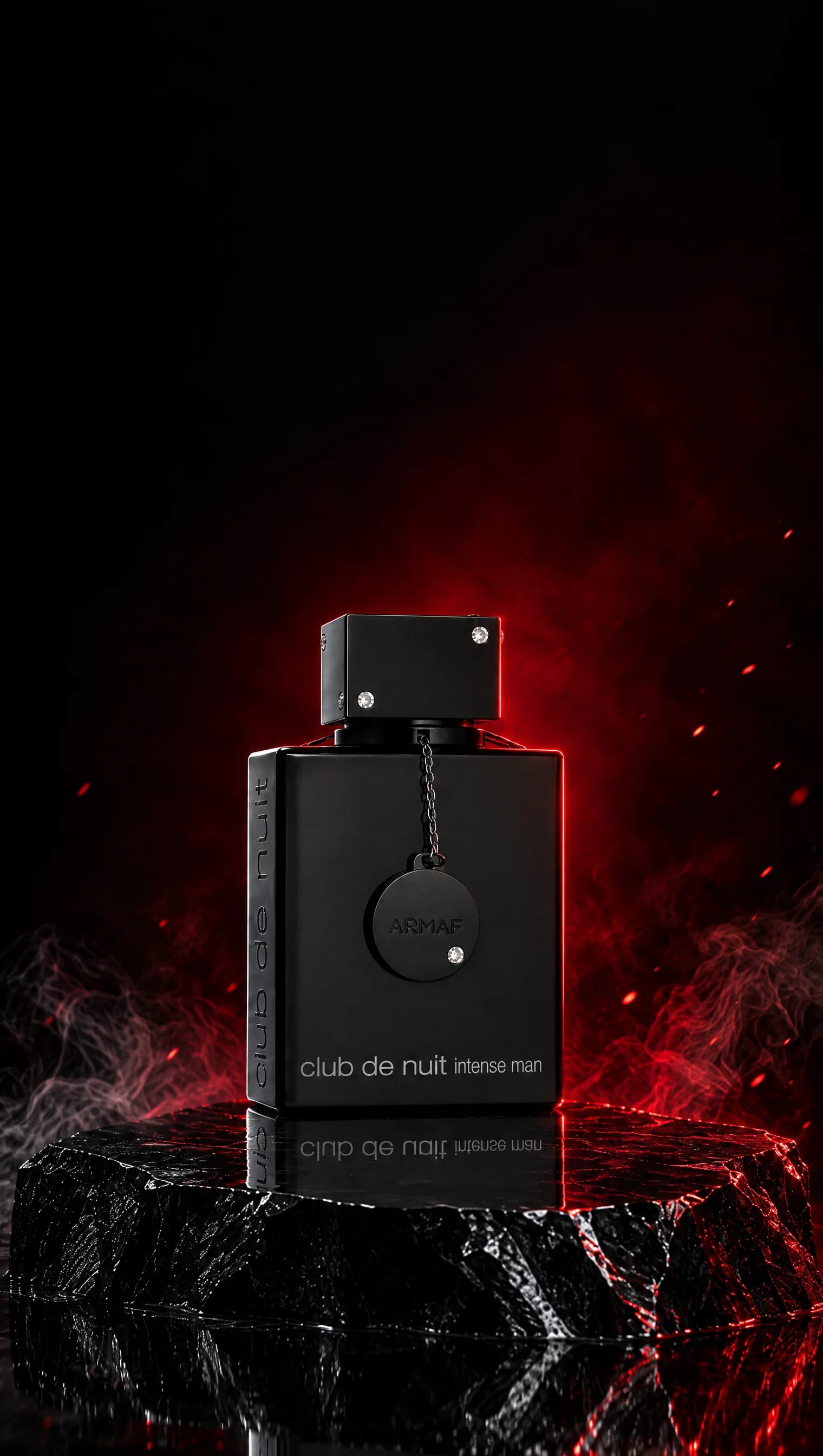 Armaf Club de Nuit Intense sobre una roca de obsidiana con luz roja